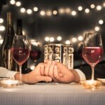 A couple having dinner and red wine.