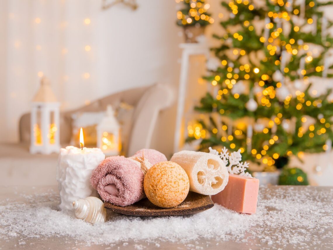 A spa table with a christmas tree in the background.