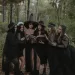 A bride and her bridesmaids in witch costumes for the bride's halloween bachelorette.